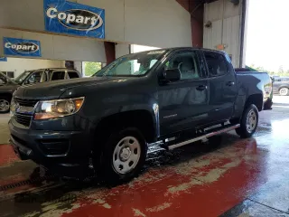2019 Chevrolet Colorado 4WD Work Truck z VIN 1GCGTBEN6K1242617, wystawiony jako Copart lot #65892805 z przebiegiem 79 318 mil mil oraz Szkoda całkowita • Salvage title. Historia ofert i sprzedaży dostępna na DreamBid. Obrazek 1.