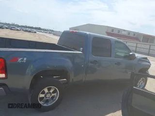 2010 GMC Sierra 1500 SLE z VIN 3GTRKVE35AG209183, wystawiony jako IAAI lot #42064516 z przebiegiem Nie podano mil oraz . Historia ofert i sprzedaży dostępna na DreamBid. Obrazek 13.