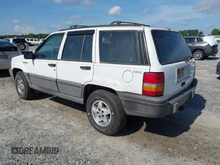 1994 Jeep Grand Cherokee Laredo with VIN 1J4GZ58S6RC295621, listed as a IAAI auction lot 42751869 with 370,230 mi miles and . Bid and sale history available at DreamBid. Image 3.