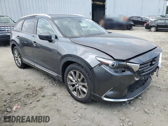 2018 Mazda CX-9 Grand Touring z VIN JM3TCBDY9J0208533, wystawiony jako Copart lot #59854635 z przebiegiem 90 263 mil mil oraz Szkoda całkowita • Salvage title. Historia ofert i sprzedaży dostępna na DreamBid. Obrazek 4.