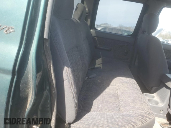 2000 Nissan Frontier XE with VIN 1N6ED27Y4YC382199, listed as a Copart auction lot 47127045 with 207,449 mi miles and Salvage title. Bid and sale history available at DreamBid. Image 10.