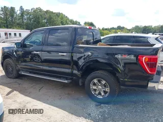 2021 Ford F-150 XL with VIN 1FTFW1E5XMKE21429, listed as a IAAI auction lot 40347406 with 125,000 mi miles. Bid and sale history available at carsss.com. Image 14.