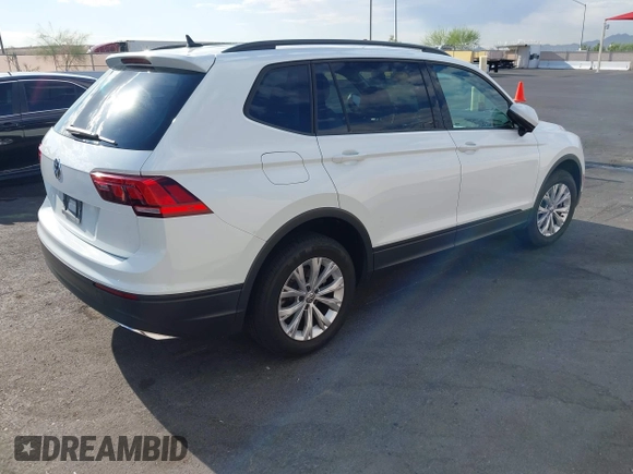 2020 Volkswagen Tiguan S with VIN 3VV1B7AXXLM036994, listed as a IAAI auction lot 42643035 with 62,676 mi miles and . Bid and sale history available at DreamBid. Image 4.