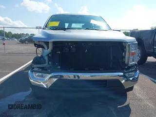 2021 Ford F-150 XL z VIN 1FTEW1CB8MKE90821, wystawiony jako IAAI lot #42733214 z przebiegiem 74 371 mil mil oraz . Historia ofert i sprzedaży dostępna na DreamBid. Obrazek 6.
