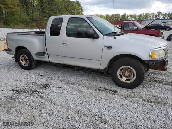 2003 Ford F-150 XL with VIN 1FTRX07W23KC51964, listed as a Copart auction lot 51669715 with 0 mi miles and Salvage Title. Bid and sale history available at carsss.com. Image 4.