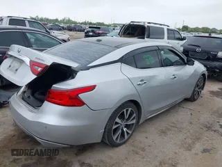 2016 Nissan Maxima SL with VIN 1N4AA6AP2GC386239, listed as a IAAI auction lot 41871290 with 175,941 mi miles and . Bid and sale history available at DreamBid. Image 4.