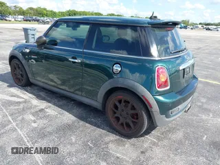 2007 MINI Hardtop S with VIN WMWMF73507TV30183, listed as a IAAI auction lot 42574374 with 90,334 mi miles and . Bid and sale history available at DreamBid. Image 3.
