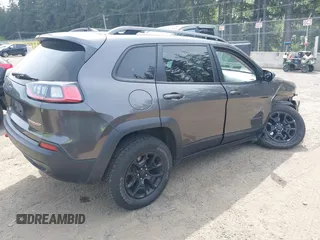 2019 Jeep Cherokee Trailhawk with VIN 1C4PJMBX2KD231734, listed as a IAAI auction lot 42235469 with 104,565 mi miles and . Bid and sale history available at DreamBid. Image 4.