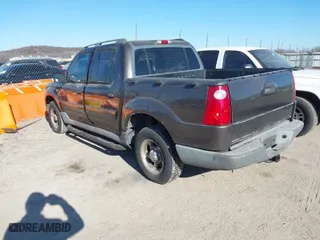 2005 Ford Explorer Sport Trac XLS with VIN 1FMZU67K65UB36425, listed as a IAAI auction lot 41291154 with 194,291 mi miles. Bid and sale history available at carsss.com. Image 3.