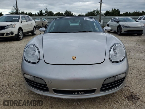 2007 Porsche Boxster S z VIN WP0CB29857U730730, wystawiony jako Copart lot #74175794 z przebiegiem Nie podano mil oraz Szkoda całkowita • Salvage title. Historia ofert i sprzedaży dostępna na DreamBid. Obrazek 5.