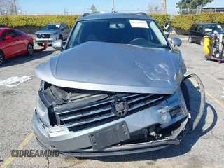 2021 Volkswagen Tiguan S with VIN 3VV1B7AX6MM131036, listed as a IAAI auction lot 41742604 with 55,155 mi miles and . Bid and sale history available at DreamBid. Image 13.