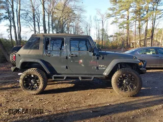 2018 Jeep Wrangler JK Unlimited Altitude with VIN 1C4BJWEG1JL842456, listed as a IAAI auction lot 41123988 with 55,310 mi miles. Bid and sale history available at carsss.com. Image 13.