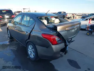 2014 Nissan Versa SV with VIN 3N1CN7AP4EL832666, listed as a IAAI auction lot 41308540 with 136,468 mi miles. Bid and sale history available at carsss.com. Image 3.