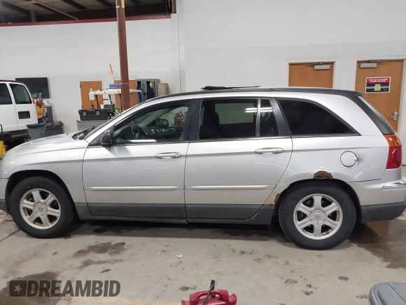 2004 Chrysler Pacifica z VIN 2C8GF684X4R626155, wystawiony jako IAAI lot #41430286 z przebiegiem 185 878 mil mil oraz . Historia ofert i sprzedaży dostępna na DreamBid. Obrazek 14.