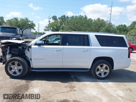2020 Chevrolet Suburban Premier with VIN 1GNSCJKC9LR125292, listed as a IAAI auction lot 42073858 with 92,363 mi miles and . Bid and sale history available at DreamBid. Image 14.