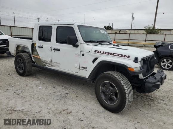 2022 Jeep Gladiator Rubicon with VIN 1C6JJTBG1NL119900, listed as a Copart auction lot 72457754 with 70,055 mi miles and Salvage title. Bid and sale history available at DreamBid. Image 4.
