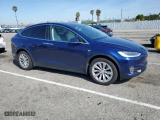 2018 Tesla Model X 75D with VIN 5YJXCBE22JF111938, listed as a Copart auction lot 47000303 with 63,430 mi miles. Bid and sale history available at carsss.com. Image 4.