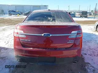 2015 Ford Taurus SEL z VIN 1FAHP2E85FG163421, wystawiony jako IAAI lot #41320489 z przebiegiem 165 618 mil mil oraz . Historia ofert i sprzedaży dostępna na DreamBid. Obrazek 16.