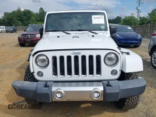 2018 Jeep Wrangler Unlimited Altitude with VIN 1C4HJWEGXJL870606, listed as a IAAI auction lot 42693031 with 92,735 mi miles and . Bid and sale history available at DreamBid. Image 13.