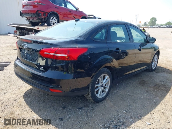 2017 Ford Focus SE with VIN 1FADP3FE6HL238324, listed as a IAAI auction lot 42346509 with 141,174 mi miles and . Bid and sale history available at DreamBid. Image 4.