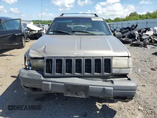 1998 Jeep Grand Cherokee Laredo z VIN 1J4GZ58S4WC278490, wystawiony jako Copart lot #62388535 z przebiegiem 133 896 mil mil oraz Czysty tytuł • Clean title. Historia ofert i sprzedaży dostępna na DreamBid. Obrazek 5.