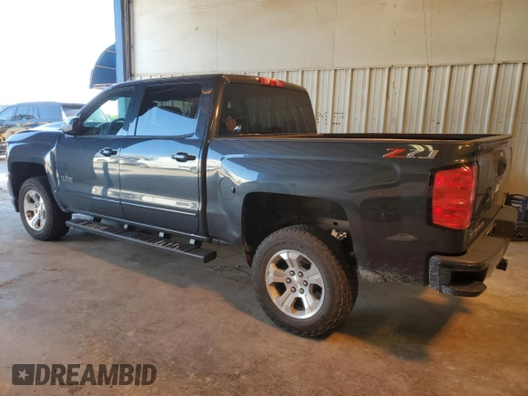2018 Chevrolet Silverado 1500 LT with VIN 3GCUKRECXJG283331, listed as a Copart auction lot 52102345 with 69,603 mi miles and Salvage Title. Bid and sale history available at DreamBid. Image 2.