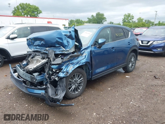 2017 Mazda CX-5 Touring z VIN JM3KFBCL9H0224962, wystawiony jako IAAI lot #42312104 z przebiegiem Nie podano mil oraz . Historia ofert i sprzedaży dostępna na DreamBid. Obrazek 18.