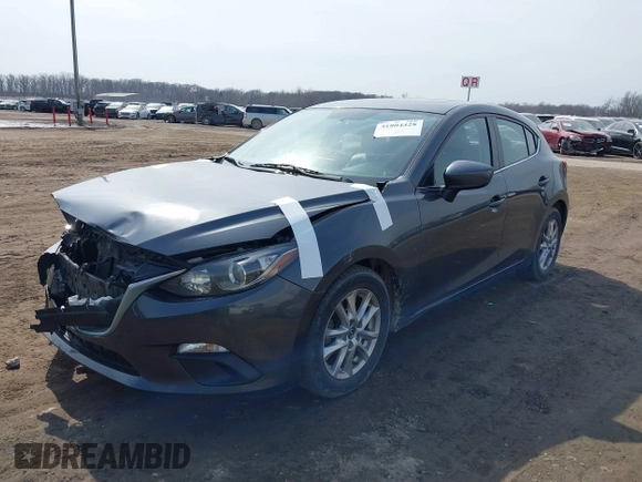 2014 Mazda 3 i Grand Touring with VIN JM1BM1M74E1212699, listed as a IAAI auction lot 41804428 with 195,472 mi miles and . Bid and sale history available at DreamBid. Image 2.
