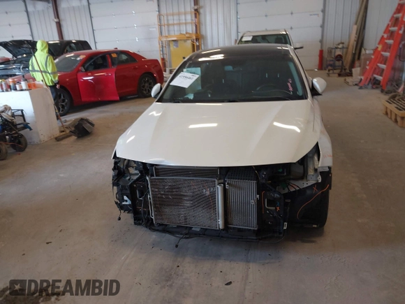 2018 Kia Optima SX with VIN 5XXGW4L27JG237960, listed as a IAAI auction lot 41956461 with 87,085 mi miles and . Bid and sale history available at DreamBid. Image 6.