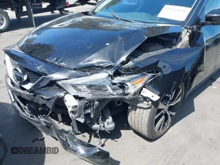 2016 Nissan Maxima SL with VIN 1N4AA6AP5GC448751, listed as a IAAI auction lot 41935029 with 105,101 mi miles and . Bid and sale history available at DreamBid. Image 6.