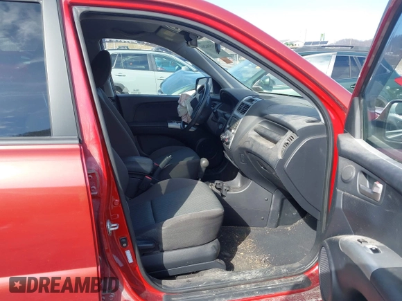 2010 Kia Sportage LX with VIN KNDKGCA39A7702017, listed as a IAAI auction lot 41596204 with 117,670 mi miles and . Bid and sale history available at carsss.com. Image 5.