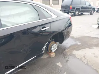 2018 Cadillac XTS Luxury with VIN 2G61M5S33J9119684, listed as a IAAI auction lot 41659807 with 107,156 mi miles and . Bid and sale history available at DreamBid. Image 17.
