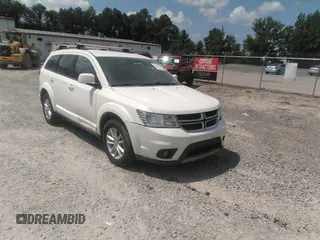 2017 Dodge Journey SXT z VIN 3C4PDCBG3HT537331, wystawiony jako IAAI lot #42694213 z przebiegiem 193 609 mil mil oraz . Historia ofert i sprzedaży dostępna na DreamBid. Obrazek 1.