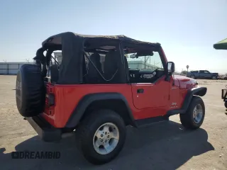 2003 Jeep Wrangler Sport z VIN 1J4FA49S33P302780, wystawiony jako Copart lot #60354805 z przebiegiem 201 679 mil mil oraz Szkoda całkowita • Salvage title. Historia ofert i sprzedaży dostępna na DreamBid. Obrazek 3.