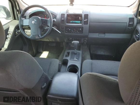 2005 Nissan Frontier LE z VIN 1N6AD07W95C417736, wystawiony jako Copart lot #55112835 z przebiegiem 217 251 mil mil oraz Szkoda całkowita • Salvage title. Historia ofert i sprzedaży dostępna na DreamBid. Obrazek 8.