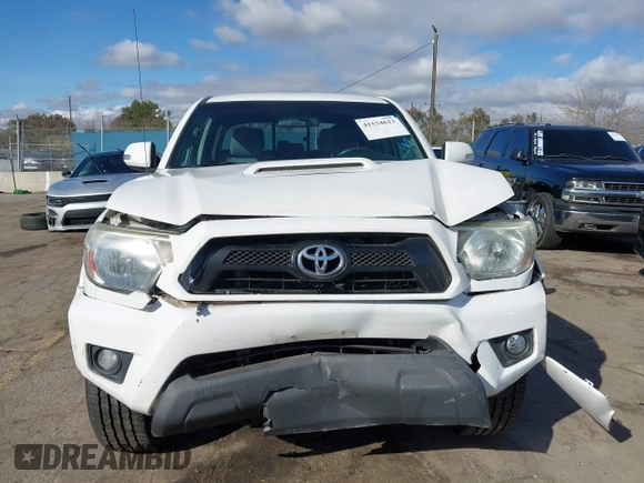 2015 Toyota Tacoma PreRunner with VIN 3TMKU4HN6FM044238, listed as a IAAI auction lot 41534623 with 196,490 mi miles and . Bid and sale history available at DreamBid. Image 12.