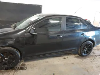 2008 Volkswagen Jetta Sedan S with VIN 3VWJM71K78M153658, listed as a IAAI auction lot 41709377 with 144,467 mi miles. Bid and sale history available at carsss.com. Image 14.