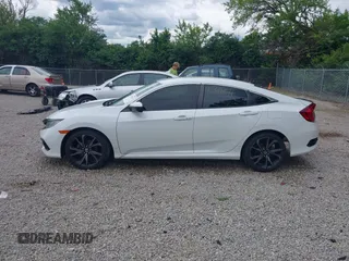 2019 Honda Civic Sport with VIN 19XFC2F85KE019311, listed as a IAAI auction lot 42319241 with 163,241 mi miles and . Bid and sale history available at DreamBid. Image 14.