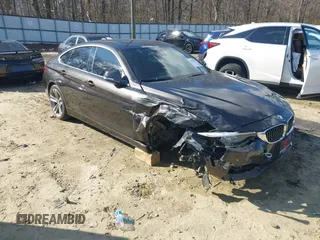 2018 BMW 4 Series 430i xDrive with VIN WBA4J3C54JBG95242, listed as a IAAI auction lot 41180565 with 83,710 mi miles and . Bid and sale history available at DreamBid. Image 1.