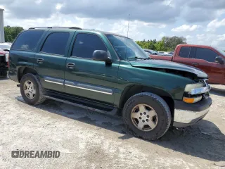 2004 Chevrolet Tahoe LT with VIN 1GNEC13Z14R191384, listed as a Copart auction lot 51371855 with 213,802 mi miles and Salvage title. Bid and sale history available at DreamBid. Image 4.