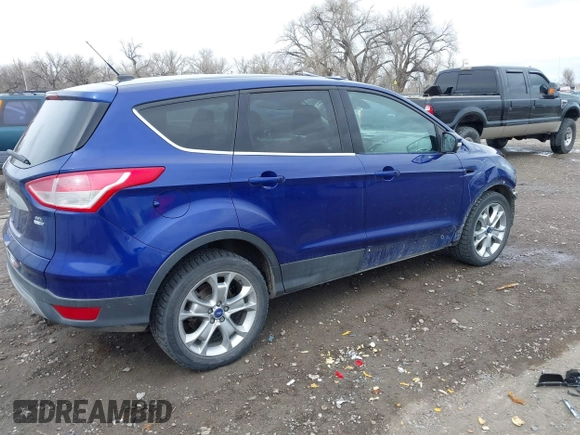 2013 Ford Escape SEL with VIN 1FMCU9H92DUA47288, listed as a IAAI auction lot 41912588 with 165,728 mi miles. Bid and sale history available at carsss.com. Image 4.
