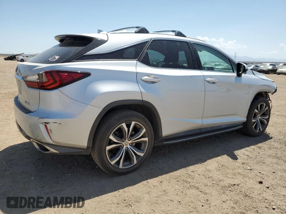 2016 Lexus RX 350 with VIN 2T2ZZMCA8GC016032, listed as a Copart auction lot 58400605 with 142,878 mi miles and Salvage title. Bid and sale history available at DreamBid. Image 3.