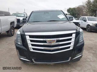 2018 Cadillac Escalade Luxury with VIN 1GYS4BKJ3JR143952, listed as a IAAI auction lot 41333902 with 124,265 mi miles. Bid and sale history available at carsss.com. Image 12.