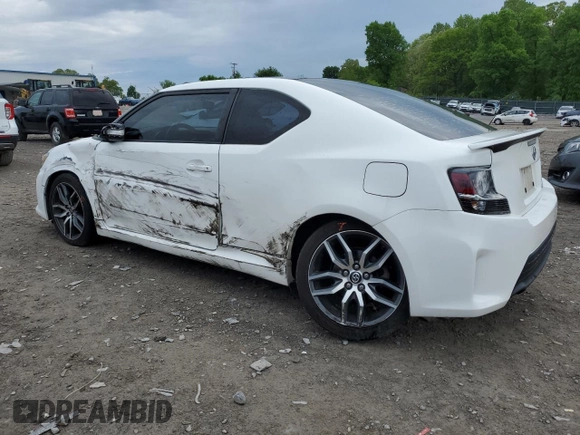 2014 Scion tC z VIN JTKJF5C70E3084411, wystawiony jako Copart lot #54255385 z przebiegiem 152 715 mil mil oraz Szkoda całkowita • Salvage title. Historia ofert i sprzedaży dostępna na DreamBid. Obrazek 2.