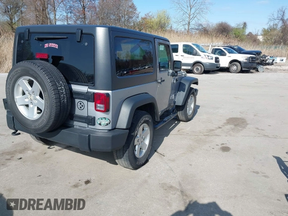 2015 Jeep Wrangler Sport with VIN 1C4GJWAG0FL503254, listed as a IAAI auction lot 41931666 with 115,394 mi miles. Bid and sale history available at carsss.com. Image 4.