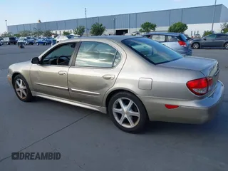 2004 Infiniti I35 with VIN JNKDA31A74T209228, listed as a IAAI auction lot 42181808 with 202,647 mi miles. Bid and sale history available at carsss.com. Image 3.