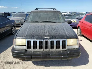 1998 Jeep Grand Cherokee Laredo with VIN 1J4GZ48Y7WC321234, listed as a Copart auction lot 75438624 with 0 mi miles and Salvage Title. Bid and sale history available at carsss.com. Image 5.