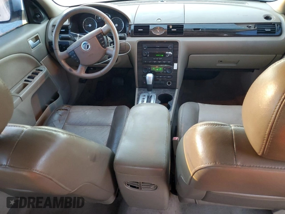 2005 Mercury Montego Luxury z VIN 1MEFM40195G608644, wystawiony jako Copart lot #83732794 z przebiegiem 231 619 mil mil oraz Szkoda całkowita • Salvage title. Historia ofert i sprzedaży dostępna na DreamBid. Obrazek 8.