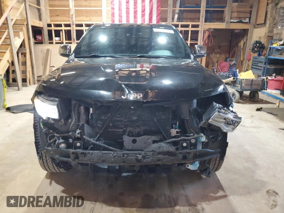 2014 Jeep Grand Cherokee Summit with VIN 1C4RJFJT7EC398488, listed as a Copart auction lot 57593975 with 64,630 mi miles and Clean title. Bid and sale history available at DreamBid. Image 5.