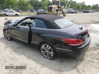 2015 Mercedes-Benz E 400 with VIN WDDKK6FFXFF295735, listed as a Copart auction lot 52134483 with 36,835 mi miles and Salvage title. Bid and sale history available at DreamBid. Image 2.